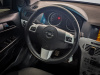 Opel Astra 2011 Серебряный