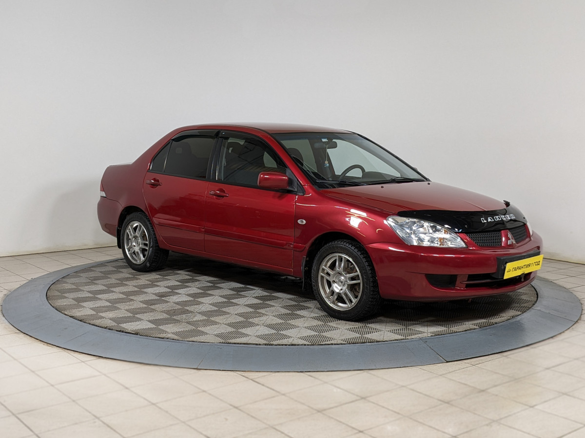 Mitsubishi Lancer 2006 красный 1.3 л. л. 2WD механика с пробегом 155 000 км  | Автомолл «Белая Башня»